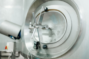 Production of milk and yogurt at the plant. Metal units and tanks for storage and transportation.