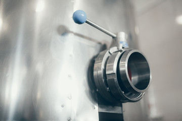 Obraz premium Production of milk and yogurt at the plant. Metal units and tanks for storage and transportation.