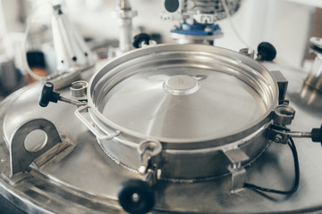 Production of milk and yogurt at the plant. Metal units and tanks for storage and transportation.