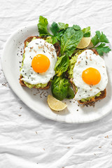 Top view healthy avocado toasts breakfast lunch avocado toast fried eggs white background