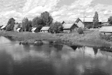 Northern russian village on riverbank