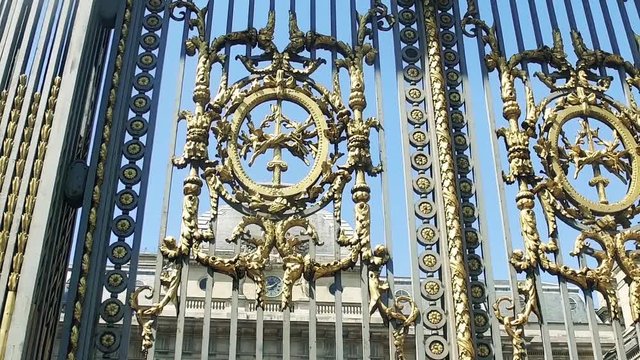 The front entrance door of the Palais de Justice in Paris, France in sunny summer day - architecture background