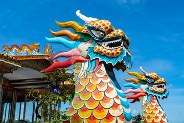 Traditional Dragon Boat on the Perfume River in Hue, Vietnam © Curioso.Photography