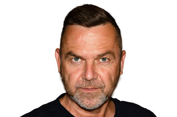 Portrait of mature man against white background