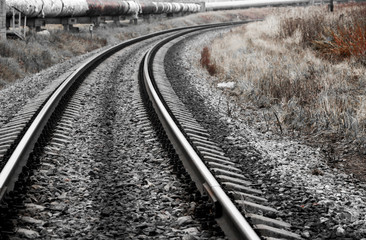 railway in the industrial zone..empty rails with a semaphore, in anticipation of a freight train.
