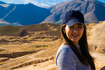 portrait of young woman in the mountains