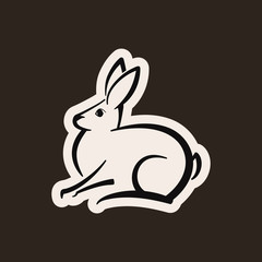 Abstract icon of a rabbit shape.