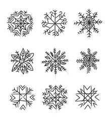 Snowflakes. Set of vector images. Hand drawing by brush.