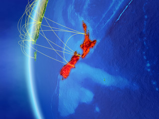 New Zealand from space on model of Earth with international network. Concept of digital communication or travel.