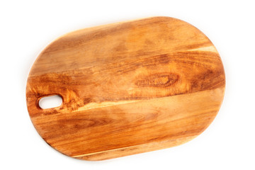 A photo of a wooden cutting board, shot from the top on a white background with a place for text. A cooking frame with copy space