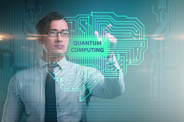 Businessman pressing virtual button in quantum computing concept