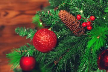 Fototapeta na wymiar Decorated Christmas tree closeup.