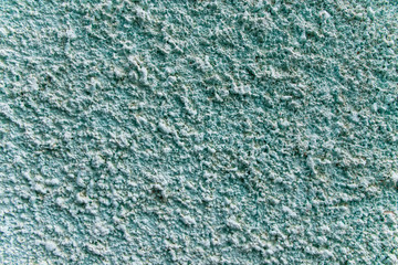 Decorative plaster on the wall of the house