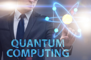 Businessman pressing virtual button in quantum computing concept