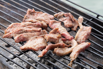 grilled pork on a hot grill