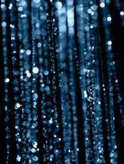 Fototapeta na wymiar blurred water drops as background