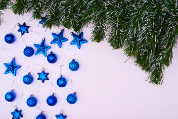 christmas background with fir tree branches and balls