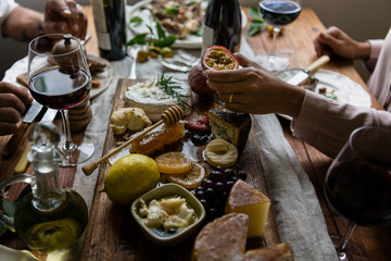 People enjoying a cheese platter food photography recipe idea