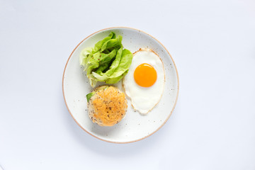 Healthy Breakfast with homemade Bread  and  hard-boiled egg with Green Salad.