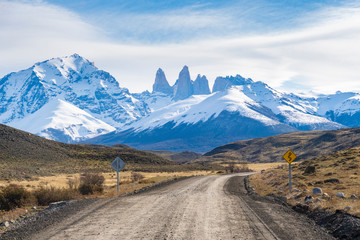 Dirt road in Torres del Paine, Chile - obrazy, fototapety, plakaty