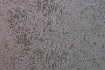 creative old purple rough painted metallic surface texture for use as background.