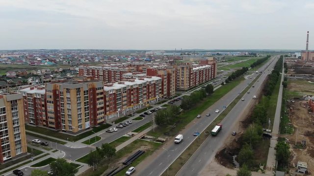 4k Aerial view of the city. Residential buildings and highways.