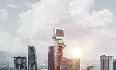 Business woman with monitor instead of head.