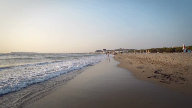 Pov walk on coas on empty beach in Dures, Albania on Adriatic sea, CINEMATIC STEADICAM SHOT