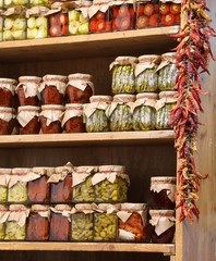 many jars with typical calabrian food