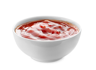 Tasty tomato sauce in bowl on white background