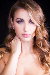 Obraz premium Closeup portrait of beautiful model with long blond hair