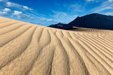 Fototapeta na wymiar Sand dunes in mountains