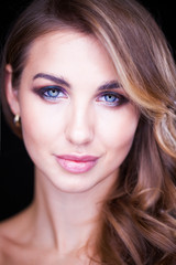 Obraz premium Closeup portrait of beautiful model with long blond hair