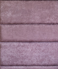 Purple fabric surface, background. Home interior decor.