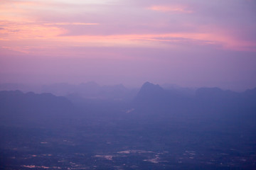 Sunrise At Pha Nok Aen , Phu Kradueng with beautiful mountain background , Loei Thailand.