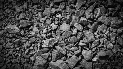 rubble texture natural abstract dark black and white vignette background close-up