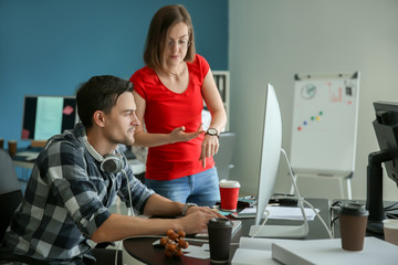 IT specialists trying to meet deadline in office