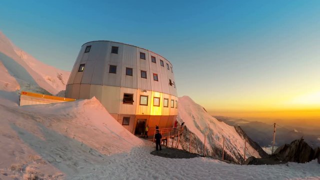 Sunset panoramic view of refuge Du Gouter 3835 m, The popular starting point for attempting the ascent of Mont Blanc , France