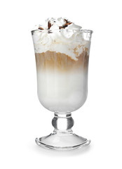 Cold coffee covered with whipped cream and chocolate in glass on white background