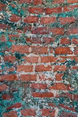 Brick wall close-up photo. Vintage textured surface with old brickwork and patina