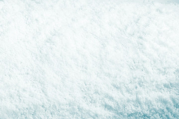 Snow background. Surface of pure snow texture.