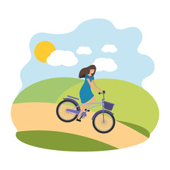 Naklejka premium young woman in bicycle on the park