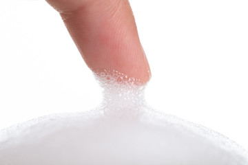 White foam bubbles texture with child finger and hand  isolated on white