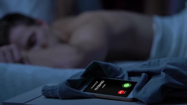 Husband call on phone, dishonest wife waking up and kissing lover, betrayal