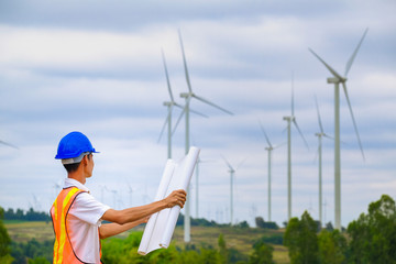 Male engineer with wind energy development for the future.