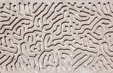Abstract labyrinth stone grey texture background.