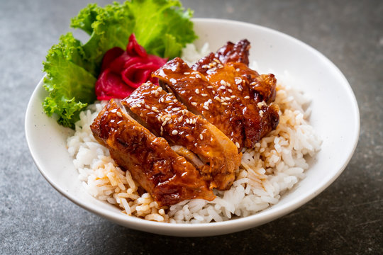 grilled chicken with teriyaki sauce on topped rice