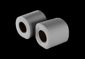 Toilet paper roll isolated on black background with clipping path