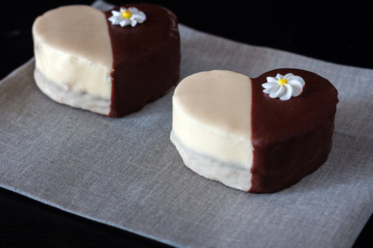 Chocolate covered biscuit in the shape of a heart
