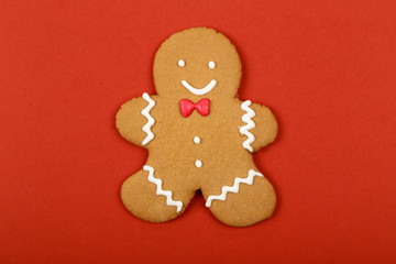  Christmas cookies, gingerbread In the form of a man on red background. Christmas background